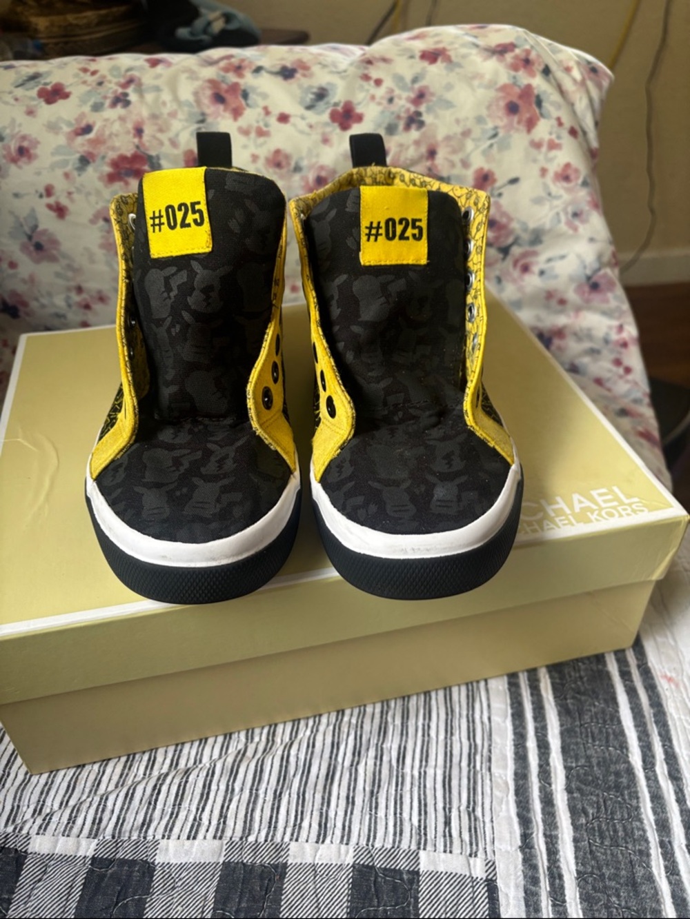 Michael Kors Black and Yellow Kids High-Top Sneakers (The size is not legible.)